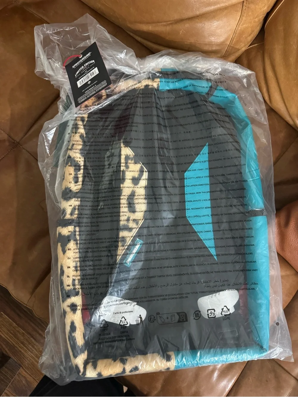 Sprayground Turquoise and Leopard Print Backpack